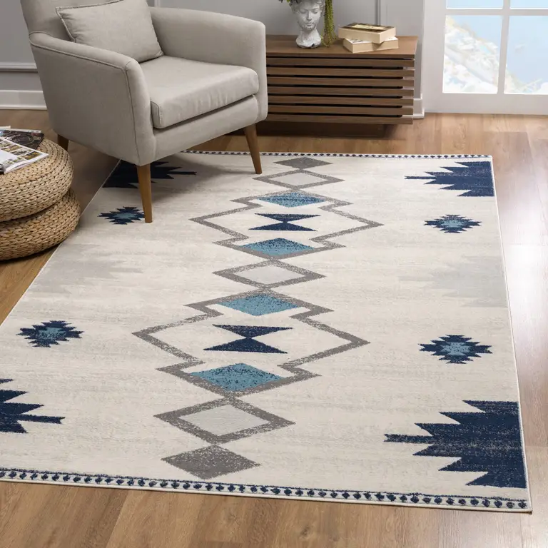 9' x 13' Navy and Ivory Tribal Pattern Area Rug Photo 1