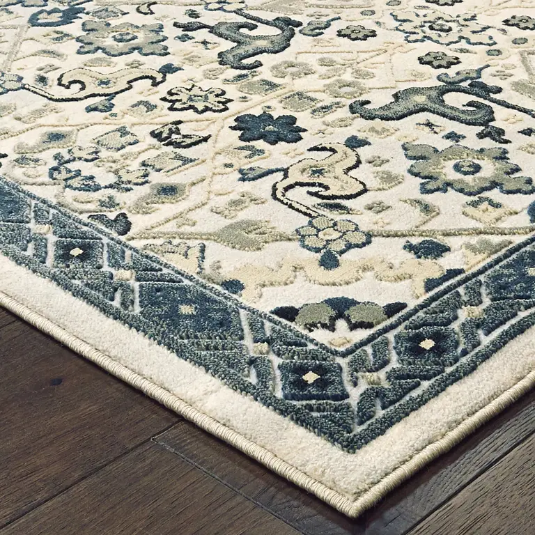 Ivory Navy And Gold Oriental Power Loom Stain Resistant Area Rug Photo 3