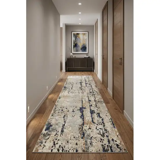 10' Beige and Ivory Abstract Power Loom Runner Rug Photo 1
