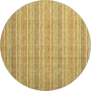 Photo of 8' Amber And Artichoke Green Striped Washable Round Rug With UV Protection