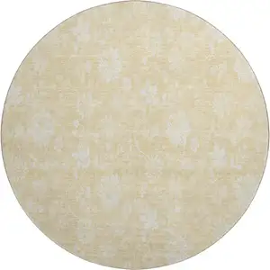 Photo of 8' Amber And Ivory Floral Washable Round Rug With UV Protection