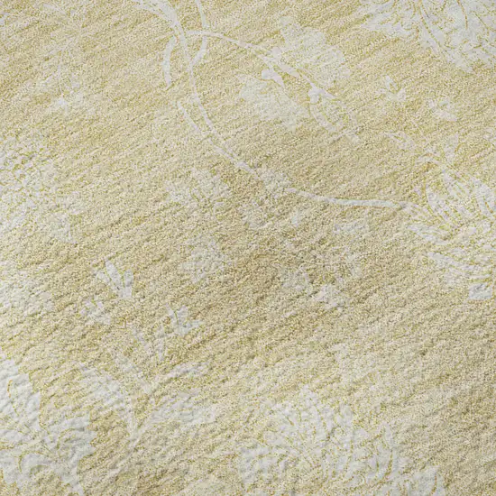 8' Amber And Ivory Floral Washable Round Rug With UV Protection Photo 8