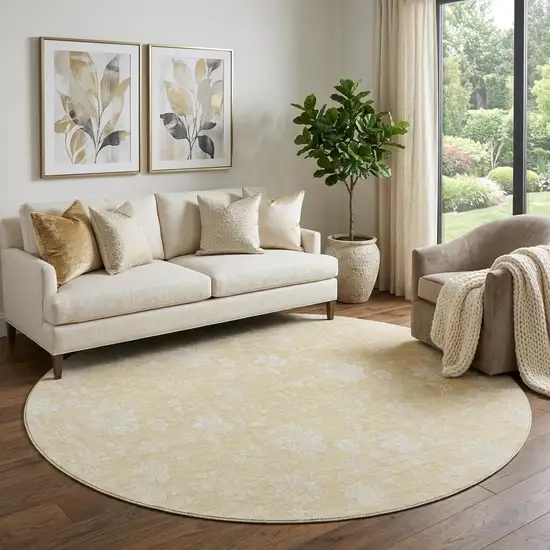 8' Amber And Ivory Floral Washable Round Rug With UV Protection Photo 1