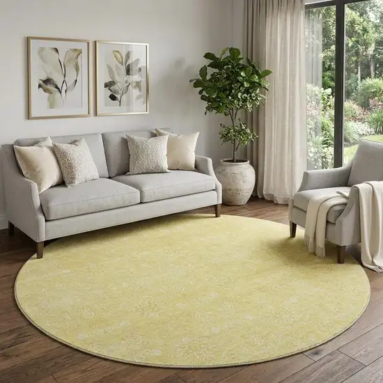8' Amber And Ivory Floral Washable Round Rug With UV Protection Photo 1