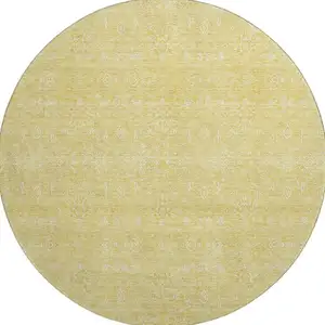 Photo of 8' Amber And Ivory Floral Washable Round Rug With UV Protection
