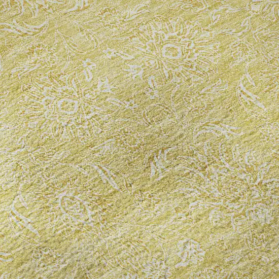 8' Amber And Ivory Floral Washable Round Rug With UV Protection Photo 8