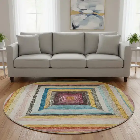 8' Amber Pink And Teal Geometric Washable Round Rug With UV Protection Photo 2