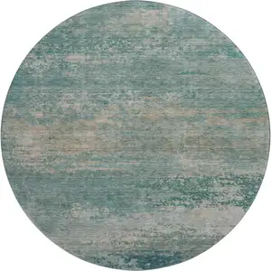Photo of 8' Aqua And Beige Abstract Washable Round Rug With UV Protection