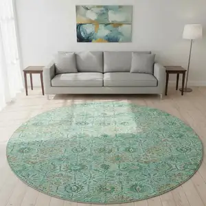 Photo of 8' Aqua And Beige Floral Washable Round Rug With UV Protection