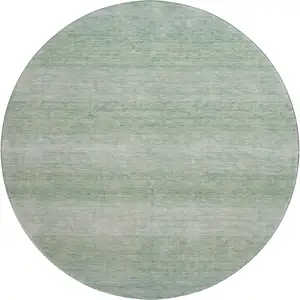 Photo of 8' Aqua And Beige Striped Washable Round Rug With UV Protection