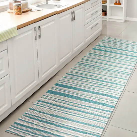 8' Aqua And Cream Striped Indoor Outdoor Runner Rug Photo 6
