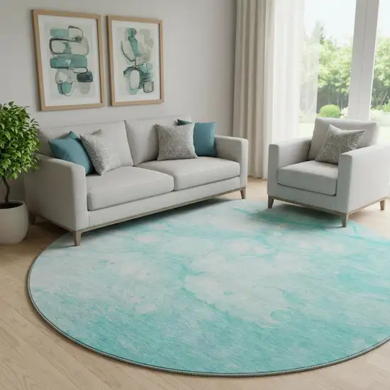 8' Aqua And Ivory Abstract Washable Round Rug With UV Protection Photo 1