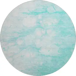 Photo of 8' Aqua And Ivory Abstract Washable Round Rug With UV Protection