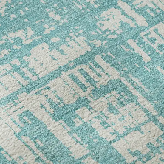 8' Aqua And Ivory Abstract Washable Round Rug With UV Protection Photo 9