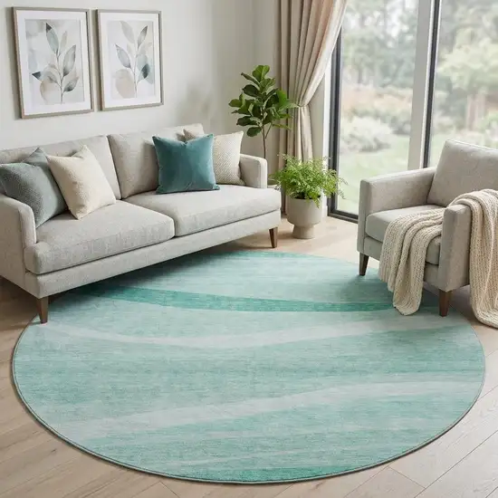 8' Aqua And Ivory Abstract Washable Round Rug With UV Protection Photo 1