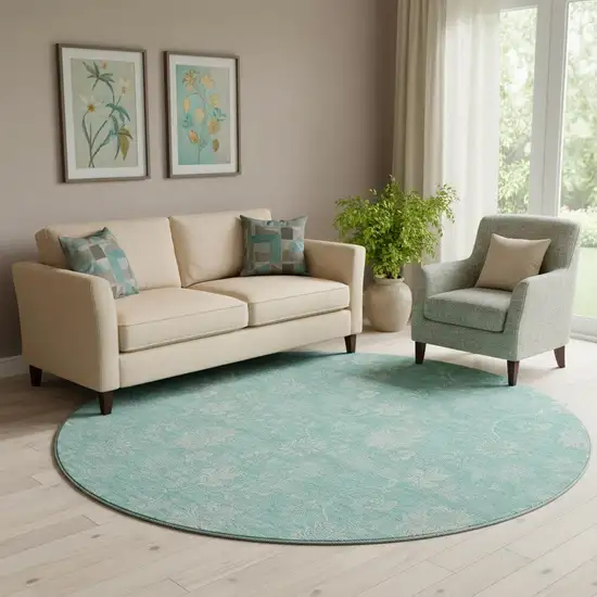 8' Aqua And Ivory Floral Washable Round Rug With UV Protection Photo 1