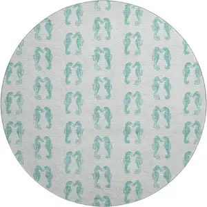 Photo of 8' Aqua And Ivory Geometric Washable Round Rug With UV Protection