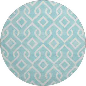 Photo of 8' Aqua And Ivory Geometric Washable Round Rug With UV Protection