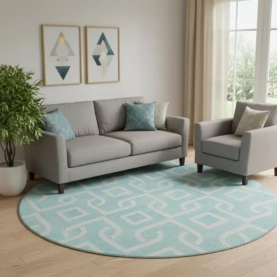 8' Aqua And Ivory Geometric Washable Round Rug With UV Protection Photo 1