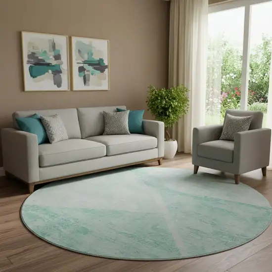 8' Aqua And Ivory Geometric Washable Round Rug With UV Protection Photo 1