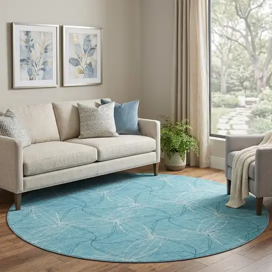 8' Aqua And Ivory Geometric Washable Round Rug With UV Protection Photo 1