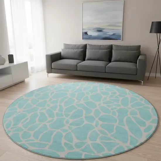8' Aqua And Ivory Geometric Washable Round Rug With UV Protection Photo 1