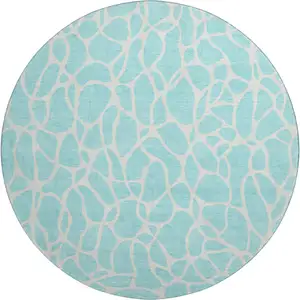 Photo of 8' Aqua And Ivory Geometric Washable Round Rug With UV Protection