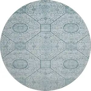 Photo of 8' Aqua And Ivory Geometric Washable Round Rug With UV Protection