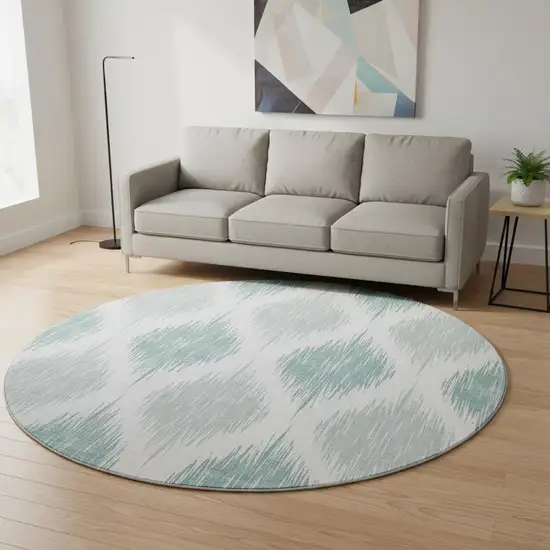 8' Aqua And Ivory Ikat Washable Round Rug With UV Protection Photo 2