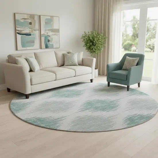 8' Aqua And Ivory Ikat Washable Round Rug With UV Protection Photo 1