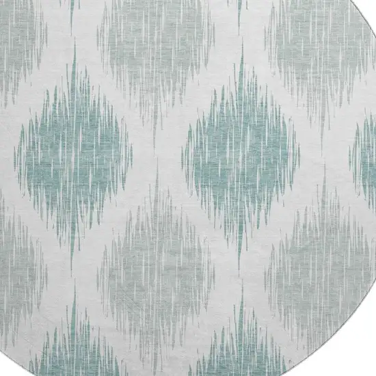 8' Aqua And Ivory Ikat Washable Round Rug With UV Protection Photo 3