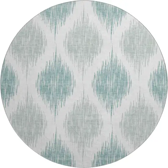 8' Aqua And Ivory Ikat Washable Round Rug With UV Protection Photo 1