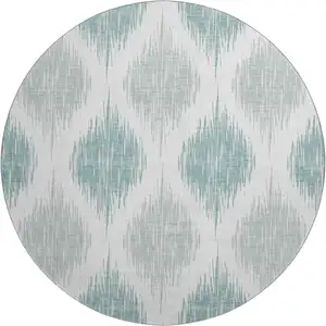 Photo of 8' Aqua And Ivory Ikat Washable Round Rug With UV Protection