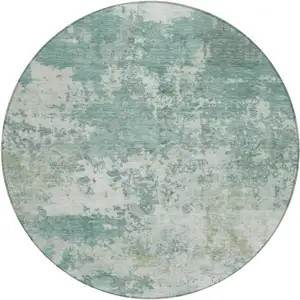 Photo of 8' Aqua And Ivory Round Abstract Washable Indoor Outdoor Area Rug