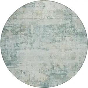 Photo of 8' Aqua And Ivory Round Abstract Washable Indoor Outdoor Area Rug