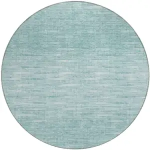 Photo of 8' Aqua And Ivory Round Abstract Washable Indoor Outdoor Area Rug