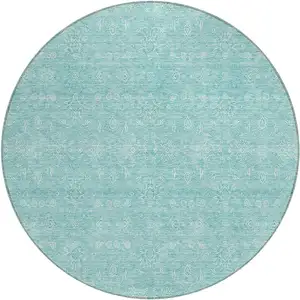 Photo of 8' Aqua And Ivory Round Floral Washable Indoor Outdoor Area Rug