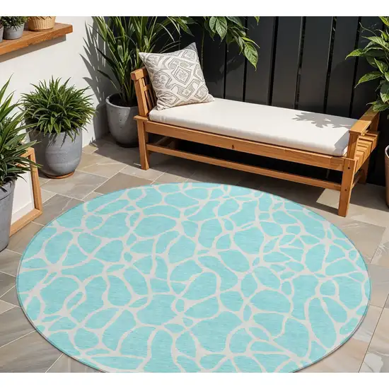 8' Aqua And Ivory Round Geometric Washable Indoor Outdoor Area Rug Photo 1