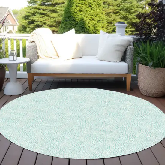 8' Aqua And Ivory Round Geometric Washable Indoor Outdoor Area Rug Photo 6