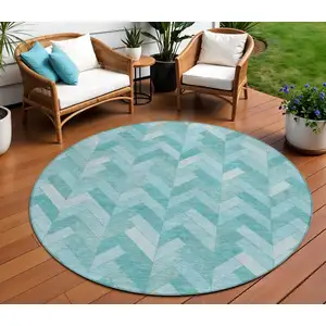 Photo of 8' Aqua And Ivory Round Geometric Washable Indoor Outdoor Area Rug