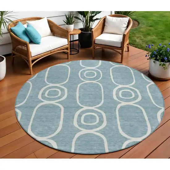 8' Aqua And Ivory Round Geometric Washable Indoor Outdoor Area Rug Photo 1