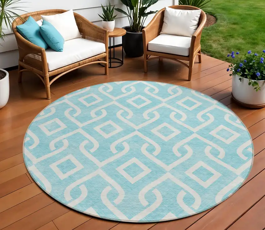 8' Aqua And Ivory Round Geometric Washable Indoor Outdoor Area Rug Photo 1