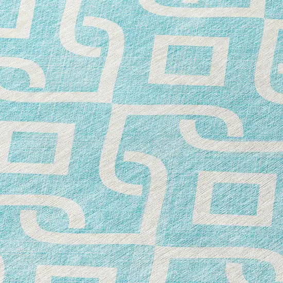 8' Aqua And Ivory Round Geometric Washable Indoor Outdoor Area Rug Photo 4