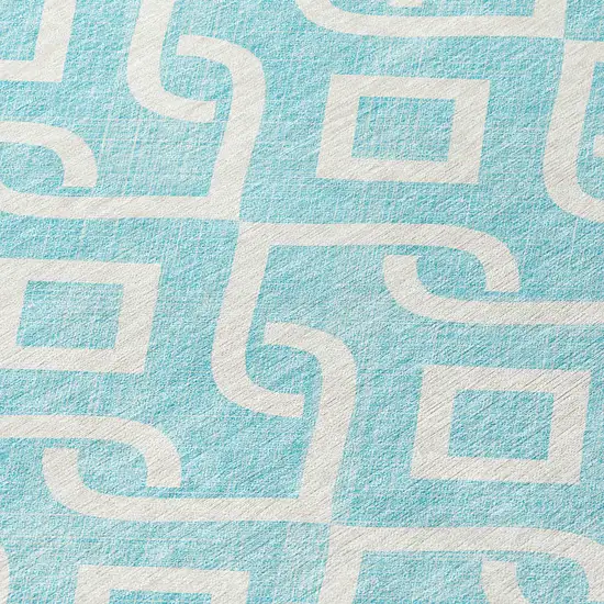 8' Aqua And Ivory Round Geometric Washable Indoor Outdoor Area Rug Photo 4