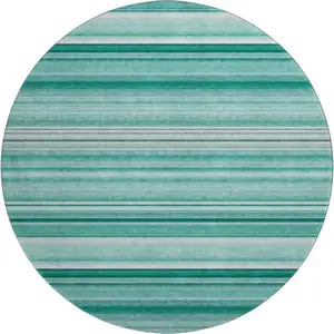 Photo of 8' Aqua And Ivory Striped Washable Round Rug With UV Protection