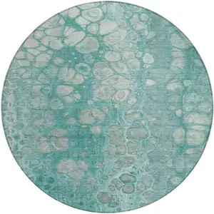 Photo of 8' Aqua And Silver Round Abstract Washable Indoor Outdoor Area Rug