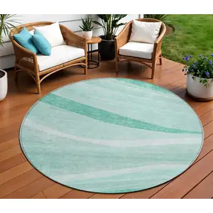 Photo of 8' Aqua And Sky Blue Round Abstract Washable Indoor Outdoor Area Rug