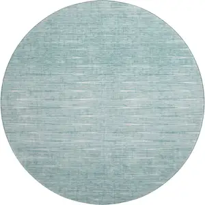 Photo of 8' Aqua And Teal Abstract Washable Round Rug With UV Protection