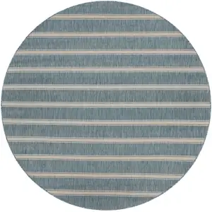 Photo of 8' Aqua And White Geometric Round Rug