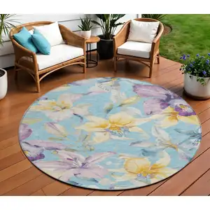 Photo of 8' Aqua Gold And Lavender Round Floral Washable Indoor Outdoor Area Rug
